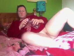 Chubby dame is jerking on live web cam, every once in a while, because it senses so superb